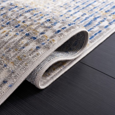 Beige and Blue Abstract Synthetic Area Rug
