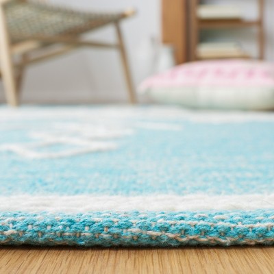 Teal and Ivory Wool Flatweave Tribal Area Rug, 5' x 8'