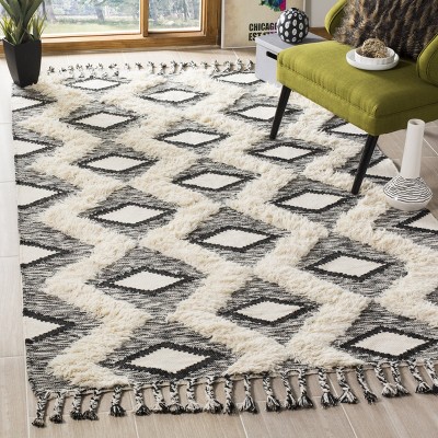 Kenya Hand-Knotted Black and Ivory Wool Area Rug