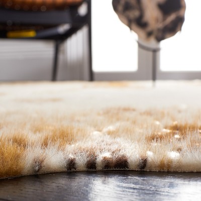 Beige and Dark Brown Faux Cowhide Area Rug