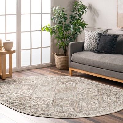 Beige Oval 6'7" x 9' Synthetic Easy-Care Area Rug