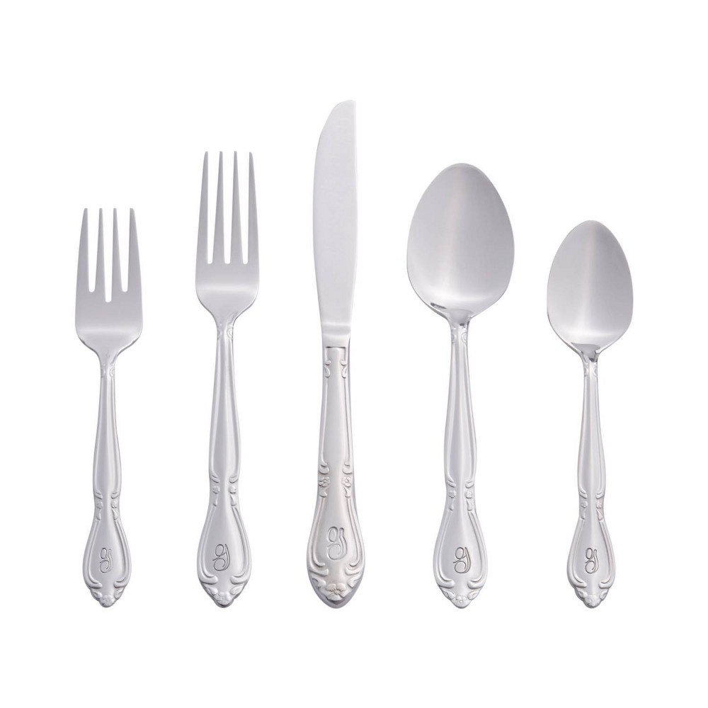 RiverRidge 46pc Personalized Rose Pattern Silverware Set G Impress family and dinner guests with this RiverRidge 46pc Monogram Rose Silverware Set A-Z. Each piece is permanently stamped with the letter of your choice. The heavy gauge stainless steel flatware has a polished mirror finish and is durable for daily use. Its traditional shape and flower blossom design will coordinate with any table setting. These pieces make a great gift for weddings or holidays. Color: One Color.