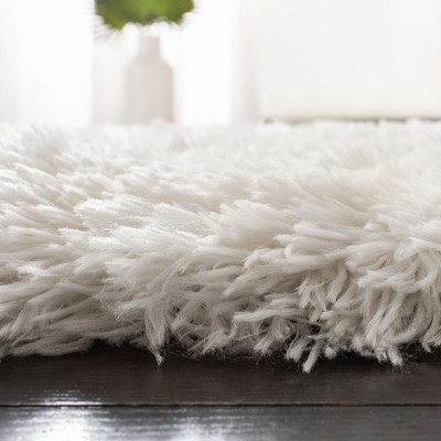 Ivory Hand-Tufted Shag Sheepskin 4' x 6' Area Rug