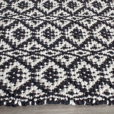 Ivory and Black Cotton Flat Woven 9' x 12' Area Rug