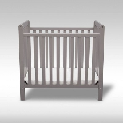 delta emery mini crib