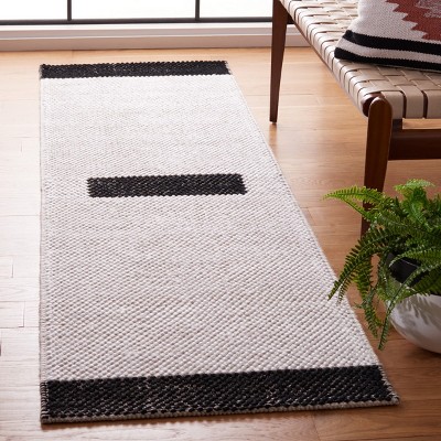 Handmade Black and Ivory Wool Flat Woven Runner Rug
