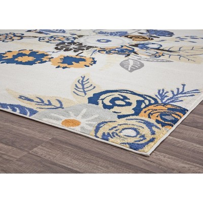 9' x 12' Blue and Ivory Floral Synthetic Area Rug
