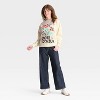 Women's Peanuts Snoopy Cote d'Azur Graphic Sweatshirt - Off-White - 3 of 3