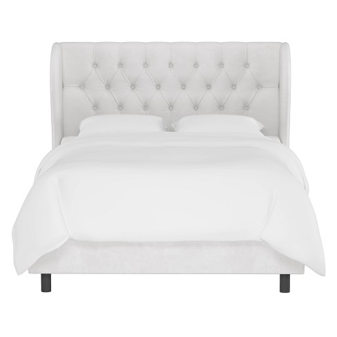 White velvet tufted deals bed