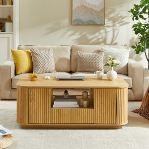 APRILSOUL46.5"modern luxury oval coffee table with drawers and storage compartments, curved contour design - 1 of 4