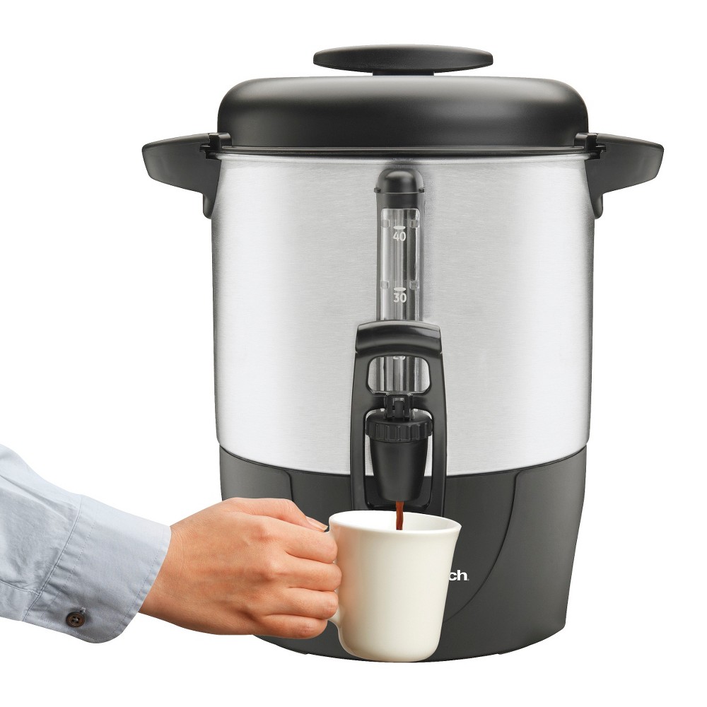 Hamilton Beach Brew Station 40 Cup Coffee - 40514 Need coffee for a crowd? The Hamilton Beach Coffee Urn, 40514R provides just the solution you've been looking for. The large 40-cupcapacity and easy to use one-hand dispenser serves coffee to a crowd and allows your guest to hold a plate of food in one hand, while dispensing coffee in the other. This Hamilton Beach Coffee Urn is easy to fill, easy to clean and you'll love the great tasting coffee. Dual heaters keep the coffee hot without overheating it. The durable metal exterior will provide years of services and won't rust or discolor. Coffee can be loaded directly into the filter basket(no paper filter needed) and lifts out for easy dishwasher cleanup. An added bonus is the water-coffee level indicator tube, which lets you know at a glance how much coffee is left in the unit. The Dispensing Hamilton Beach Coffee Urn also comes with an illuminated ready light, making this coffee urn a smart choice.