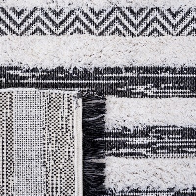 Ivory Nomadic Charm 5' x 7' Synthetic Flat Woven Area Rug