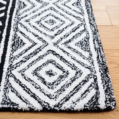 Capri Black and Ivory Hand-Tufted Wool 4' x 6' Area Rug