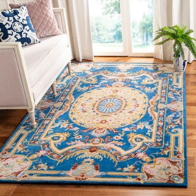 Hand-Tufted Blue and Ivory Wool Rectangular Area Rug, 4' x 6'