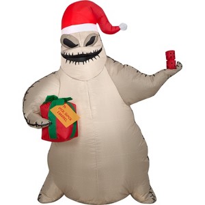 Gemmy Christmas Airblown Inflatable Oogie Boogie w/Santa Hat and Present, 3.5 ft Tall, Brown - 1 of 3