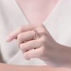 Chic Rose Gold Plated Band Ring with Brilliant Clear Cubic Zirconia Stones for a Timeless and Elegant Touch of Sparkle - 2 of 3