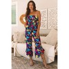 Amaryllis Women's Strapless Ruffle Hem Jumpsuit Smocked Waist Wide Leg Flowy One-Piece Effortless Outfit - 2 of 4