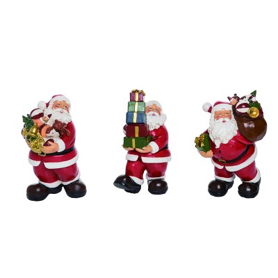 Transpac Resin 7 in. Red Christmas Traditional Santa Holding Gifts Set of 3