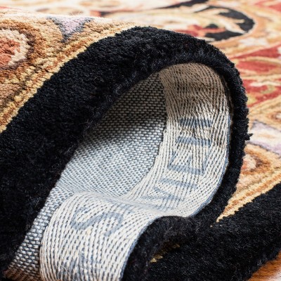 Handmade Round Red and Black Wool Tufted Rug