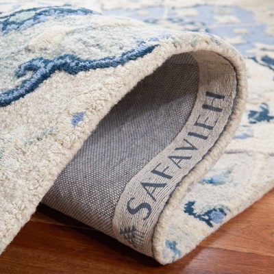 Blue and Beige Hand-Tufted Wool 6' x 9' Area Rug