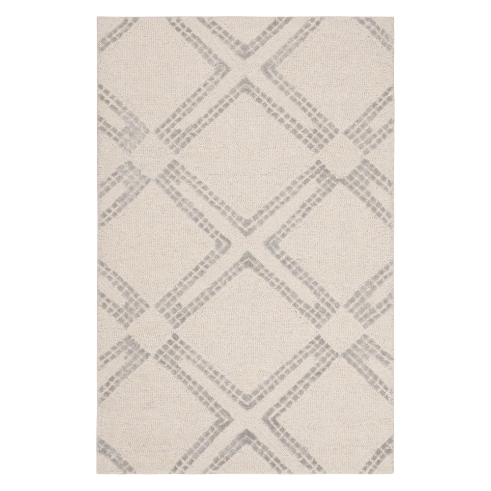 2'6inx4' Medallion Tufted Accent Rug Ivory/Silver - Safavieh