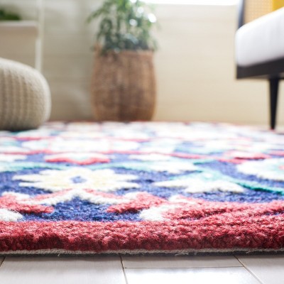 Handmade Blossom Red Floral Wool Area Rug - 8' x 10'
