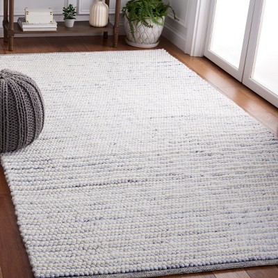 Handmade Ivory and Blue Wool Rectangular Area Rug 4' x 6'