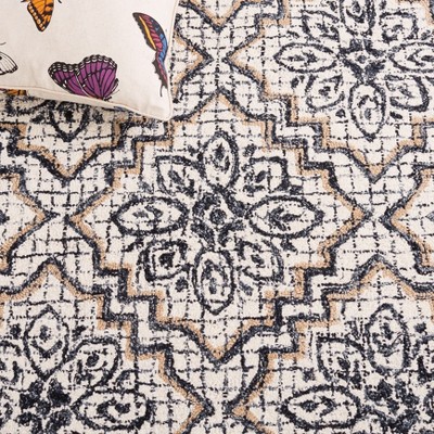 Ivory and Navy Tufted Wool Abstract Area Rug