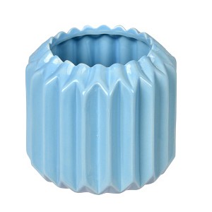 Vickerman 5.25" Powder Blue Ceramic Pot. Let this pot stand on its own or pair with a faux floral for a finished look. It measures 5.25 tall by 5.5 - 1 of 1