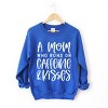 Simply Sage Market A Mom Who Runs On Caffeine And Kisses Sweatshirt - 2 of 4