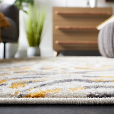 Beige and Gold Synthetic Rectangular 4' x 6' Area Rug