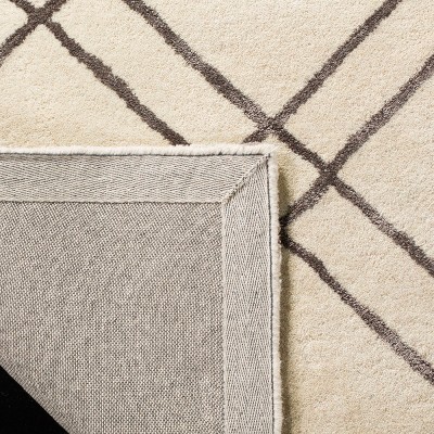Hand-Tufted Artisan Square Wool Rug in Rich Brown