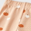 Baby Girls' 2pc Smiling Pumpkin Peplum T-Shirt and Bike Shorts Set - Cat & Jack™ Peach Orange - 4 of 4