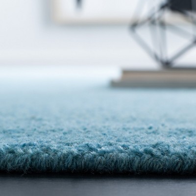 Turquoise Handmade Wool 9' x 12' Tufted Area Rug
