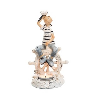 Beachcombers Resin Vintage Boy On Wheel Figure Figurine Table Home Decor Beach Coastal Ocean Sea Life Marine Nautical 4.33 x 3.94 x 7.87 - 1 of 2