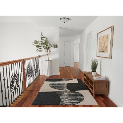 Xander Black and Ivory Geometric Synthetic Rug 2' x 3'