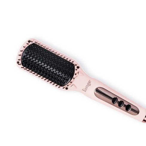 Straightening brush outlet