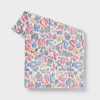 Image of Abstract Pattern Plush Throw Blanket - Room Essentials™: Cozy Knitted Design, Recycled Polyester, 50x60"