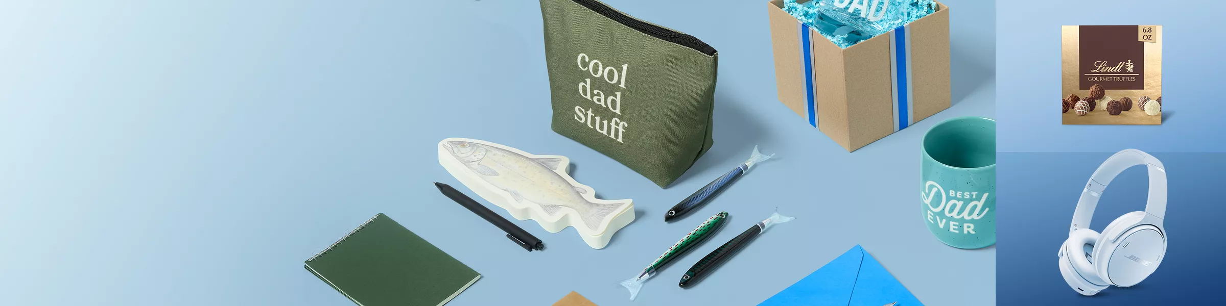Collection of Father's Day items for Dads. Such as mugs, pens, Lindt chocolates and bose headphones.