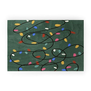 Gigi Rosado Christmas fairy lights Welcome Mat - Society6 - 1 of 3