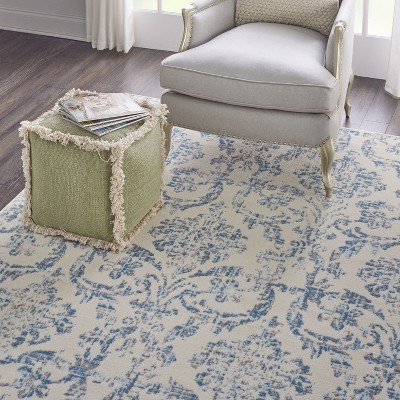 Elegant Ivory and Blue Damask 7' x 10' Synthetic Area Rug