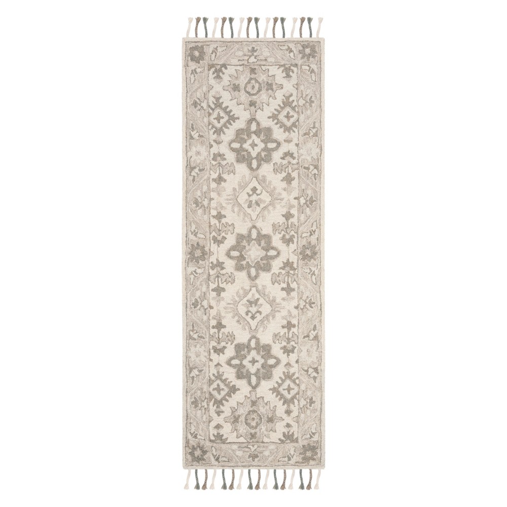 2'3inx7' Carolyn Medallion Tufted Area Rug Light Gray/Gray - Safavieh