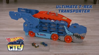 Hot Wheels City Ultimate Hauler, Transforms into a T-Rex with Race Track,  Stores 20+ Cars, 4Y+, Blue