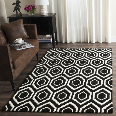 Handmade Black and Ivory Wool Tufted 5' x 8' Area Rug