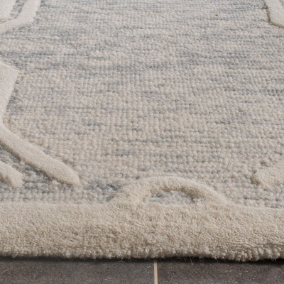 Handmade Light Grey Ivory Wool 8' x 10' Tufted Area Rug