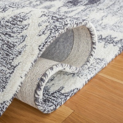 Handmade Black and Ivory Wool Tufted Rectangular Area Rug