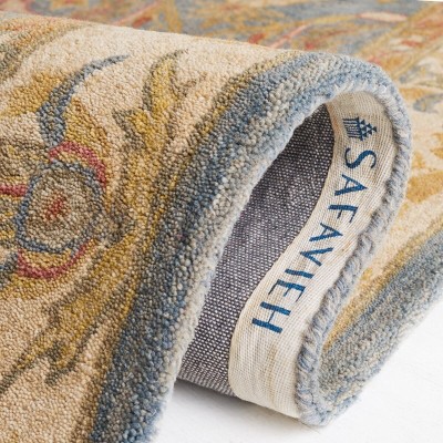 Handmade Light Blue and Ivory Floral Wool 6' x 9' Area Rug