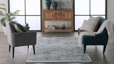 Ivory and Navy Medallion Synthetic 4' x 6' Area Rug