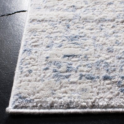 Amelia Ivory and Blue Abstract 3' x 5' Synthetic Area Rug