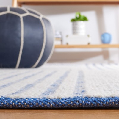 Ivory and Blue Flat Woven Wool Area Rug